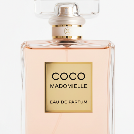 CHANEL Coco Mademoiselle EDP close-up gold logo and glass bottle detail