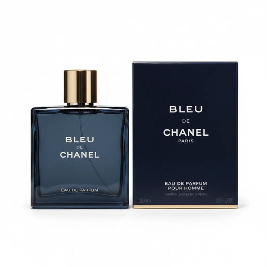 Bleu de Chanel perfume bottle and packaging on a beige fabric background