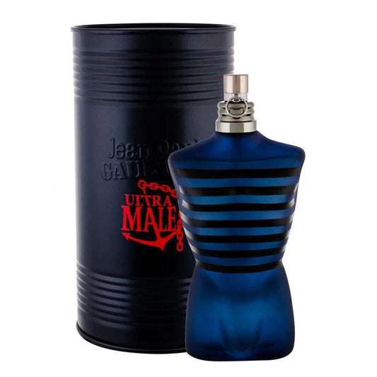 Blue perfume bottle with black and red design next to a black cylindrical container on a white background