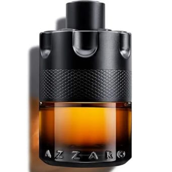 Azzaro perfume bottle with black cap and brown body on a white background