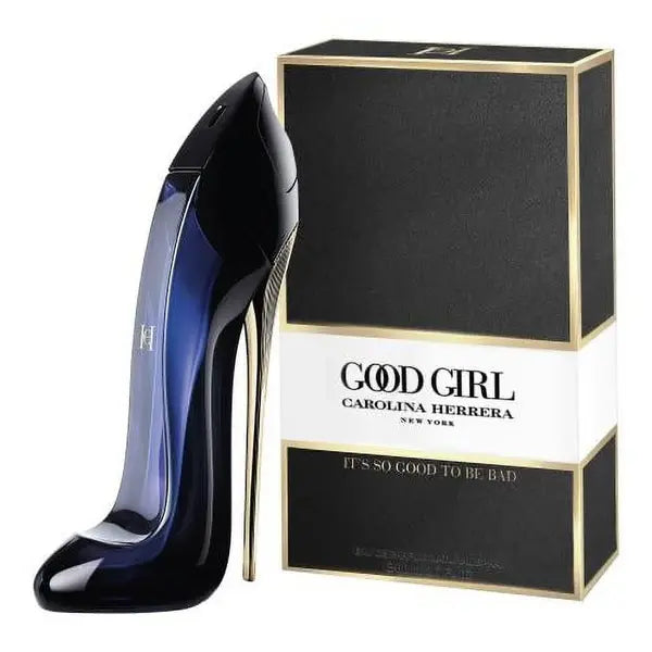 Black high-heeled shoe and Carolina Herrera 'Good Girl' perfume box on a white background