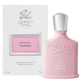 Pink Creed Spring Flower perfume bottle and packaging on a white background