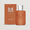 Brown perfume bottle with silver cap and matching box on a light gray background