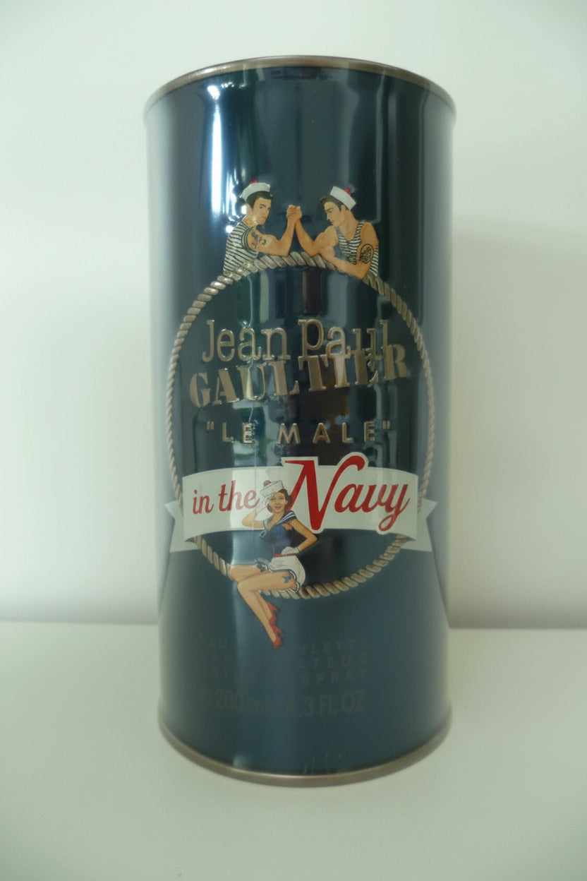 Cylindrical container with 'Jean Paul Gaultier Le Male in the Navy' branding on a white background