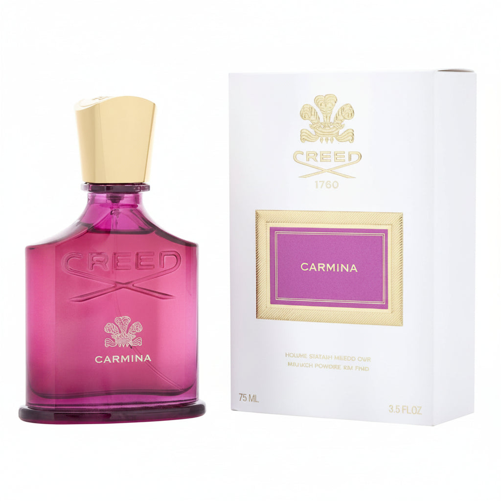 Pink Creed Carmina perfume bottle with white box on a white background